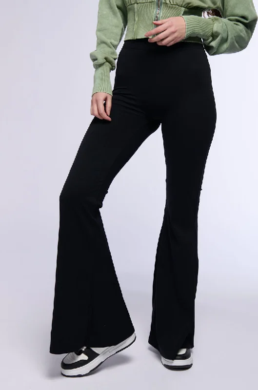 ON THE RUN RUCHED BACK FLARE LEGGING IN BLACK Stylish Athletic Wear Leggings